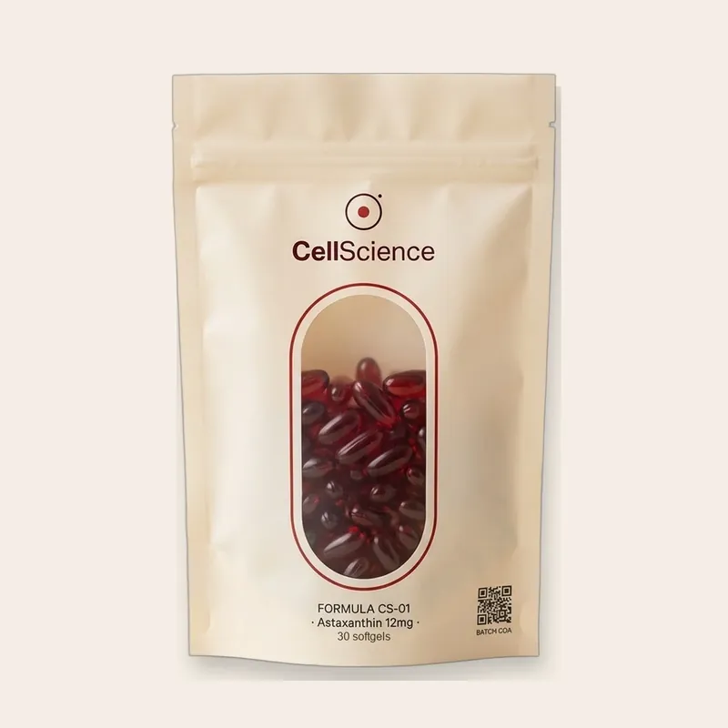 The CellScience bag: a cream pouch with a window showing the dark red softgels inside